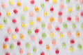 Small round candy-colored pastels on pastel background