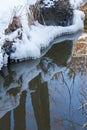 Small round icicles over water Royalty Free Stock Photo