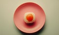 Delicate Sushi Treat Displayed on a Soft Pink Plate in a Minimalistic Setting Royalty Free Stock Photo