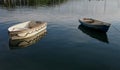 Small rowing boats on calm water