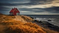 Small, rustic red fishing house sits on beautiful coastline