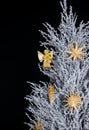 Small rustic table Xmas tree with golden straw decorations