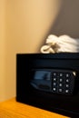 Small safe in hotel room, safety box with electronic lock Royalty Free Stock Photo
