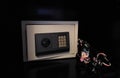 Small safe on shelf in your home or hotel. Personal safe in hotel room with digital code Royalty Free Stock Photo