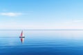 a small sailing boat on a calm blue sea