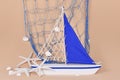 Sailing boat decoration with starfish and fishing net