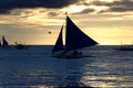 Small sailing boats at the sunset. Boracay, Philippines Royalty Free Stock Photo