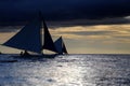 Small sailing boats at the sunset. Boracay, Philippines Royalty Free Stock Photo