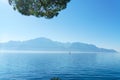 A small sailing yacht on the Lake Geneva and the Alps, Switzerland Royalty Free Stock Photo