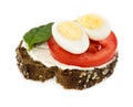 Small sandwich with spinach, tomato and quail eggs Royalty Free Stock Photo