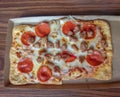 Small sausage and pepperoni flatbread pizza Royalty Free Stock Photo