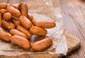 Small Sausages on wood