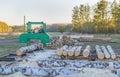 A small sawmill for processing wood in the countryside. Aspen logs. Royalty Free Stock Photo