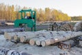 A small sawmill for processing wood in the countryside. Aspen logs