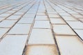 Small-scale background texture of old white tile pavement Royalty Free Stock Photo