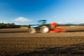 Tractor in plowed field Royalty Free Stock Photo