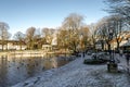 A small scenic lake with lots of birds in a cold but sunny winter morning, Stavanger city park