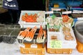 Small seafood display front of seafood shop with large king crab legs