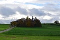 small settlement Fraukirch during autumn with the dirt road to it