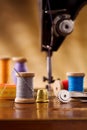 Small sewing wooden bobbin with other items Royalty Free Stock Photo