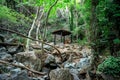 A small shed with a bench in the middle of a hiking trek to Caledonia waterfall, Cyprus Royalty Free Stock Photo