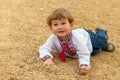 Small shild fall down and smile Royalty Free Stock Photo
