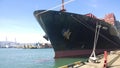 A small ship moored to the pier in the port Royalty Free Stock Photo