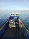 Small ship for sea transportation, transporting motorbikes, passengers from Balikpapan to Penajam, the capital of the New State.