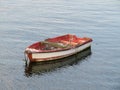 Small shipwreck boat alone at sea support for seagulls