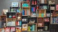 Small shop interior details. Wooden shelves with different goods and personal hygiene or cosmetics products in a store