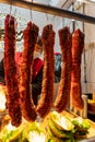 A small shop selling fried pork belly in Chongqing Food Street. T