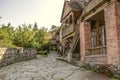 Small shops on the street Sharambeyan in old houses made of rough stone and brick columns,with wooden carved balconies in the Mu