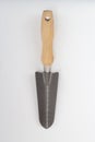 Small shovel with scale and wooden handle, gardening tool