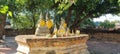 A small shrine in a beautiful park area of a large temple complex in Thailand Royalty Free Stock Photo