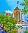 The shrine covered with colorful ceramic tiles of Wat Ratchabophit temple in Bangkok, Thailand