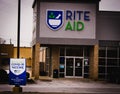 A small sign advertising the COVID-19 vaccine at a local Rite Aid drug store in Middlefield, Ohio Royalty Free Stock Photo