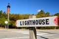 A small sign directs visitors to the lighthouse