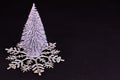 Small Silver Christmas Tree Large Snowflake Black Background Copy Space Royalty Free Stock Photo