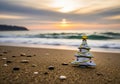 Small silver Christmas tree ornament on sandy beach at sunset Royalty Free Stock Photo