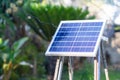 Small size solar cells panels in the garden. Installation photovoltaic for providing light at night. Concept of energy and Royalty Free Stock Photo