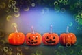 Small smile pumpkins and common pumpkins in black with blue background and colorful with sparkly