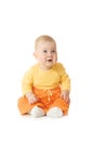 Small smiling baby in orange wear