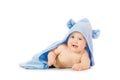 Small smiling baby with a towel