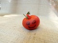 Small smiling cherry tomato Royalty Free Stock Photo