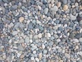 Small smooth pebbles texture background Royalty Free Stock Photo