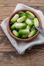 Small snack cocktail Dutch cucumbers Quirk variety on wooden background