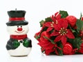 Christmas composition,flowers and a small snowman Royalty Free Stock Photo