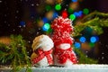 Small snowman toy on lights background Royalty Free Stock Photo