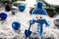 Snowman toy with shovel Royalty Free Stock Photo