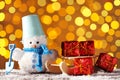 Snowman toy with wooden sleigh Royalty Free Stock Photo